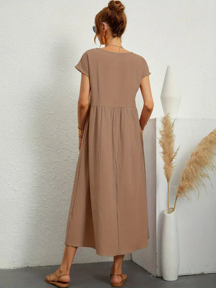 SEGOVIA - Vestido fluido con elegancia temporal