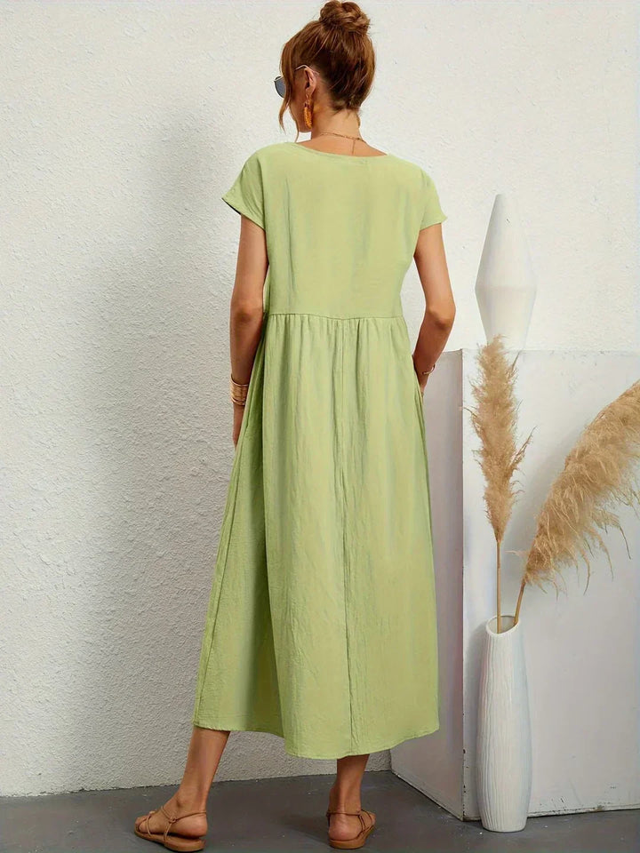 SEGOVIA - Vestido fluido con elegancia temporal